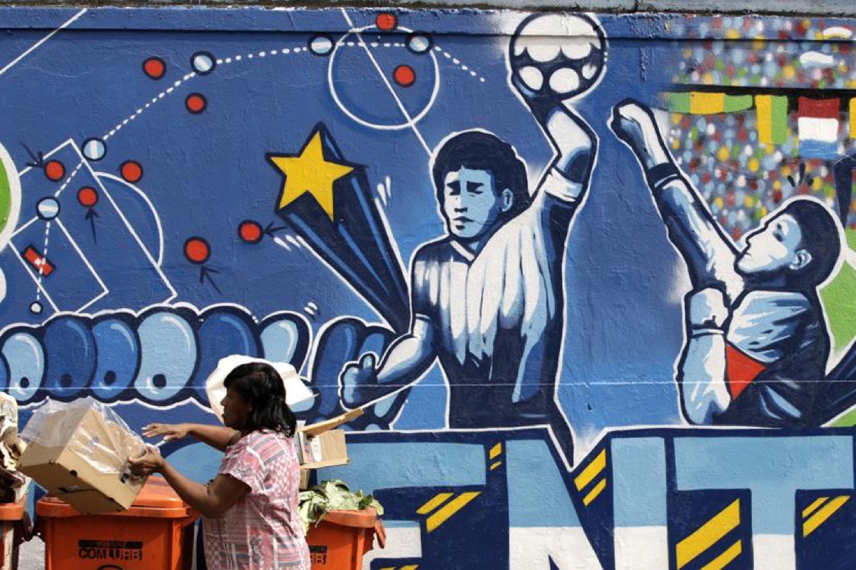 Mural and context of Diego Maradona's Hand of God goal — ball up for auction by Heritage Auctions