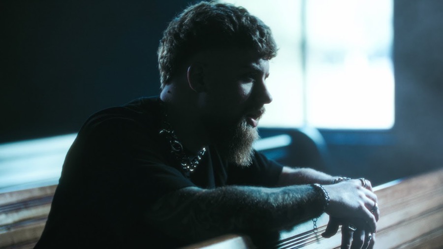 Nate Vickers in the official music video for Falling Away From Heaven